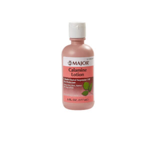 A small pink bottle of Garnier skin care product with a white cap.
