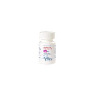 A small white bottle of Cetirizine HCl allergy tablets.