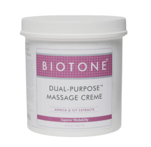 Jar of Biotone Dual-Purpose Massage Creme with a white lid.