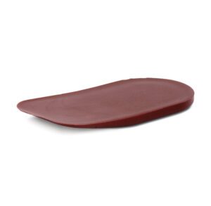 A sleek, maroon-colored orthopedic insole with a contoured shape.