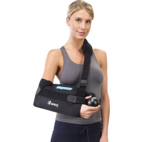 Woman wearing a black arm sling for injury support.