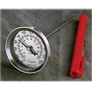 A round meat thermometer with a red handle for grilling or cooking.