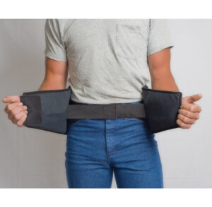 Man wearing a gray shirt and blue jeans with a black waist support belt.
