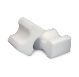 White foam contour pillow with ergonomic curves.