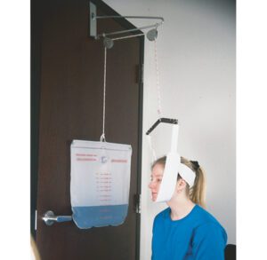 A person using a vision test device with eye charts and measurement tools.