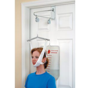Woman using a cervical traction device attached to a door.