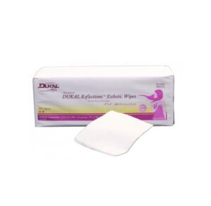 Pack of sterile wound dressings with one dressing partially out.