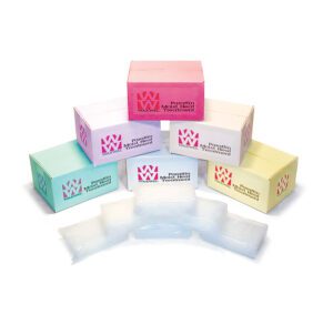 Colorful boxes of dental floss picks with opened individual packs in front.