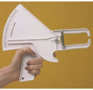 A hand-held skinfold caliper measuring skin thickness.
