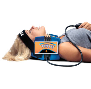 Woman lying down with a blood pressure cuff on her arm and a monitor on her chest.