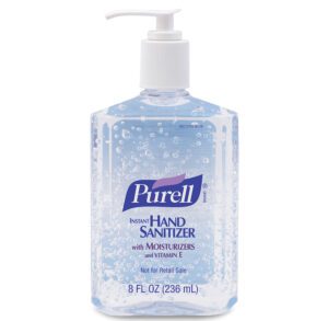 A clear bottle of Purell hand sanitizer with a pump.