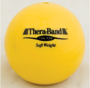 Yellow Thera-Band soft weight exercise ball.