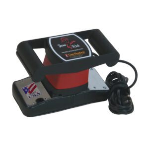 A black and red electronic device with a cord, possibly a charger or power adapter.