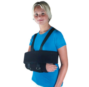 Woman wearing a black arm sling on her right arm.
