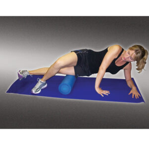Woman exercising on a yoga mat using a foam roller for muscle relief.