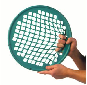 Hands holding a round green netted object with a grid pattern.