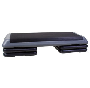 Black aerobic step platform with adjustable risers for exercise.