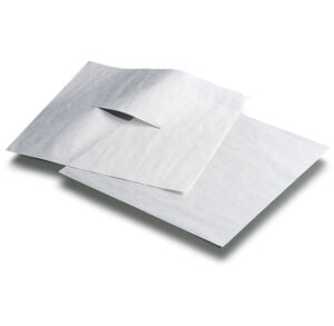 White square paper napkins folded and stacked.
