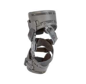 A gray knee brace with adjustable straps and hinges.
