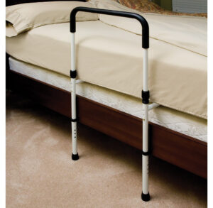 Adjustable bed assist rail for support and safety.