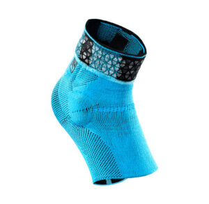 Blue compression ankle sleeve with black adjustable strap for support.